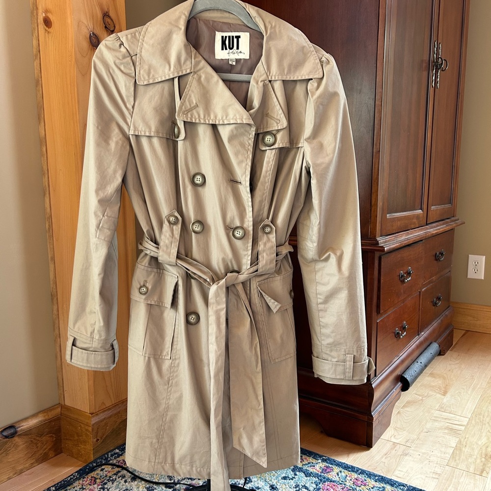 Modern trench coat with belt.